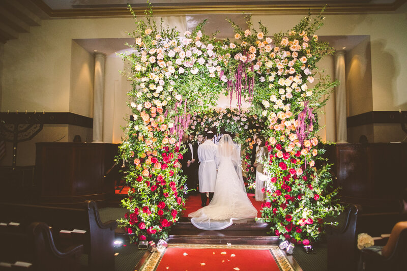 A documentary wedding moment at Temple Emanu-El