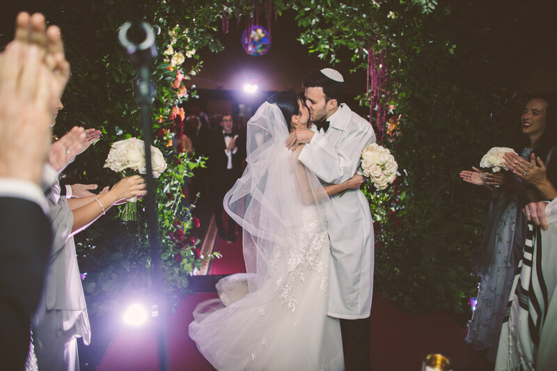 A documentary wedding moment at Temple Emanu-El
