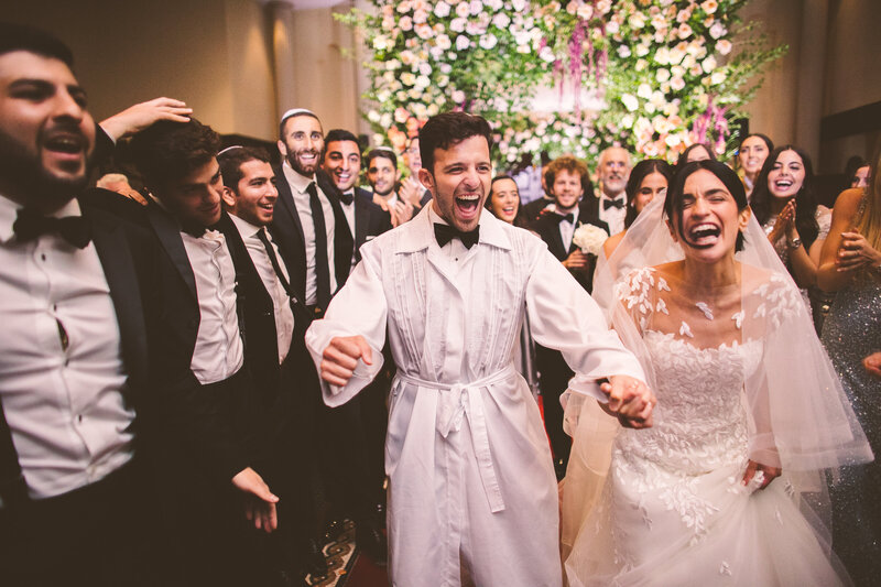 A documentary wedding moment at Temple Emanu-El